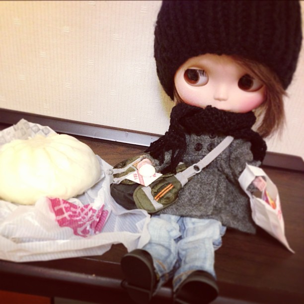 Mini Me is enjoying a trip to a Japanese corner store XD